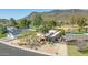 This beautiful home is situated amongst a golf course, mature landscaping and features multiple garages and driveway parking at 902 W Moon Valley Dr, Phoenix, AZ 85023