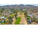 This community features a golf course, mountain views, mature landscaping, and single-Gathering homes at 902 W Moon Valley Dr, Phoenix, AZ 85023
