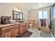 Bathroom with wood cabinets and tiled walls at 902 W Moon Valley Dr, Phoenix, AZ 85023