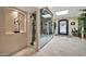 Elegant entryway with marble floors, an ornate front door and a temperature-controlled wine room at 902 W Moon Valley Dr, Phoenix, AZ 85023