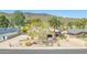 This home features desert landscaping, a well-maintained front yard, and is situated with a view of the nearby mountain at 902 W Moon Valley Dr, Phoenix, AZ 85023