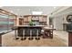 Bright eat-in kitchen boasts a center island, a breakfast bar, and stainless steel appliances at 902 W Moon Valley Dr, Phoenix, AZ 85023