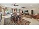 The expansive living room offers seamless indoor-outdoor living with access to a patio and includes entertainment amenities at 902 W Moon Valley Dr, Phoenix, AZ 85023