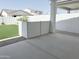 An ample patio area featuring an decorative dividing fence, perfect for outdoor relaxation and entertaining at 10150 E Thistle Ave, Mesa, AZ 85212
