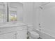 Modern bathroom showcases a vanity with hard surface counters and a tub-shower combo at 10150 E Thistle Ave, Mesa, AZ 85212
