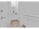 Bright and airy bathroom with white cabinetry and modern fixtures at 10150 E Thistle Ave, Mesa, AZ 85212