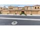 Attractive townhome complex featuring multiple units with garages and well-maintained landscaping at 10655 N 9Th St # 207, Phoenix, AZ 85020