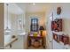 Upper hallway with custom decor, window and staircase at 10655 N 9Th St # 207, Phoenix, AZ 85020