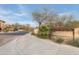 Elegant community entrance sign featuring stone accents, mature landscaping, and clear signage for easy navigation at 10655 N 9Th St # 207, Phoenix, AZ 85020
