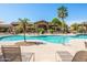 Resort-style community pool with surrounding deck, perfect for relaxation and recreation at 11500 E Cochise Dr # 1063, Scottsdale, AZ 85259
