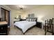 Comfortable bedroom featuring a ceiling fan, mirrored closet, and a serene atmosphere at 12212 N Paradise Village S Pkwy # 444, Phoenix, AZ 85032