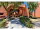 Exterior entrance to building with desert landscaping and beautiful architecture at 12212 N Paradise Village S Pkwy # 444, Phoenix, AZ 85032