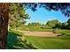 Picturesque view of the golf course featuring a sand trap and lush green grass at 12212 N Paradise Village S Pkwy # 444, Phoenix, AZ 85032