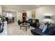 Comfortable living room with stylish seating, tiled floors, and bright, natural light at 12212 N Paradise Village S Pkwy # 444, Phoenix, AZ 85032