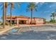 Charming clubhouse with beautiful landscaping, a community hub for golfers at 12939 W Prospect Dr, Sun City West, AZ 85375