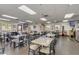 A large dining area perfect for eating and congregating inside the community building at 12939 W Prospect Dr, Sun City West, AZ 85375