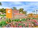 Sun City West recreation center sign surrounded by a beautiful flower garden at 12939 W Prospect Dr, Sun City West, AZ 85375