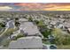 Expansive community aerial view showcasing lush greenery, sparkling pools, and stunning mountain views at 16044 N 106Th Way, Scottsdale, AZ 85255