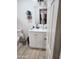 Bright bathroom featuring a single sink vanity with white cabinets and modern faucet, providing a functional and clean design at 1618 S Cedar Dr, Apache Junction, AZ 85120