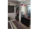 Functional bedroom with built-in closet, dresser, and a view to the outside at 1618 S Cedar Dr, Apache Junction, AZ 85120