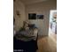 Cozy bedroom with unique decorations, comfortable bed, and easy access to the kitchen at 1618 S Cedar Dr, Apache Junction, AZ 85120