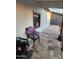 Charming outdoor patio area featuring a stylish stone tile floor, offering a cozy spot to relax and enjoy the scenery at 1618 S Cedar Dr, Apache Junction, AZ 85120