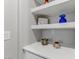 Charming decor displayed on built-in shelves, adding character to the space at 17145 W Hadley St, Goodyear, AZ 85338