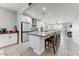 Bright, open kitchen with a large island, stainless steel appliances, and modern finishes at 17145 W Hadley St, Goodyear, AZ 85338