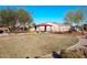 Community playground with a covered picnic area and mature trees at 18346 W Sweet Acacia Dr, Goodyear, AZ 85338