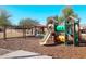 Neighborhood playground with multiple slides and covered picnic area for residents at 18346 W Sweet Acacia Dr, Goodyear, AZ 85338