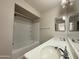 Well lit bathroom with double sinks and vanity, as well as shower-tub combo at 1920 E Bell Rd # 1006, Phoenix, AZ 85022