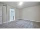 Another view of the bedroom, leading to the ensuite bathroom and closet at 1920 E Bell Rd # 1006, Phoenix, AZ 85022