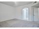 Open bedroom layout showcasing access to the bathroom and ample space for relaxation and personalization at 1920 E Bell Rd # 1006, Phoenix, AZ 85022