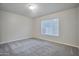 Bright bedroom with a large window, providing natural light and a view at 1920 E Bell Rd # 1006, Phoenix, AZ 85022