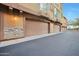 Multi-unit garages with architectural details enhance curb appeal at 1920 E Bell Rd # 1006, Phoenix, AZ 85022