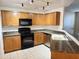 Well-equipped kitchen features stainless steel appliances and granite countertops at 1920 E Bell Rd # 1006, Phoenix, AZ 85022