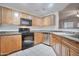 Kitchen featuring granite countertops, stainless steel appliances, and ample cabinet space at 1920 E Bell Rd # 1006, Phoenix, AZ 85022