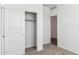 Bedroom closet with sliding doors, shelves and hanging rod at 25364 W Sunland Ave, Buckeye, AZ 85326