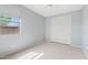 Bedroom with a closet, carpet flooring, light blue walls, and a window at 25424 S 224Th Pl, Queen Creek, AZ 85142