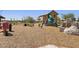 Community playground with tractor, slide, and spring riders create a fun and engaging space at 25424 S 224Th Pl, Queen Creek, AZ 85142