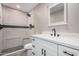 Bathroom showcasing tiled shower, black fixtures, and modern vanity at 3315 W Shaw Butte Dr, Phoenix, AZ 85029