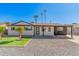 Charming single-story home featuring a landscaped front yard and a welcoming entrance at 3315 W Shaw Butte Dr, Phoenix, AZ 85029