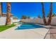 Backyard showcasing a private pool, patio furniture and tall palm trees at 3315 W Shaw Butte Dr, Phoenix, AZ 85029