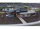 Aerial view highlights the community center and pool with clubhouse, walking path, and common area at 3513 E Audrey Dr, San Tan Valley, AZ 85143