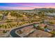 Expansive aerial view of neighborhood showing homes with landscaping and beautiful desert mountain scenery at 3953 E Lafayette Ave, Gilbert, AZ 85298