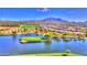Picturesque aerial view showcasing the community's golf course, lake, and surrounding landscape at 3953 E Lafayette Ave, Gilbert, AZ 85298