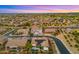 Vast aerial perspective showcasing a lush residential neighborhood with homes and desert mountain views at 3953 E Lafayette Ave, Gilbert, AZ 85298