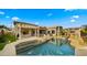 Spacious pool and outdoor area complete with a built in grill, covered patio, and ample seating perfect for entertaining at 3953 E Lafayette Ave, Gilbert, AZ 85298