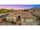 Charming single-Gathering home featuring a three-car garage, with desert landscaping, and mountain scenery at 3953 E Lafayette Ave, Gilbert, AZ 85298