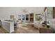 Inviting living room featuring a stone fireplace, neutral decor, ample natural light, and an open layout at 3953 E Lafayette Ave, Gilbert, AZ 85298
